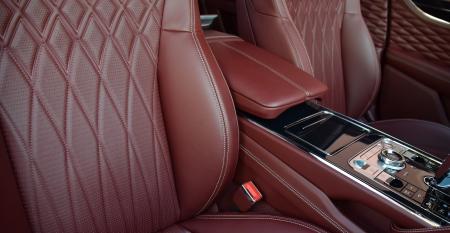 Bentley Flying Spur  console and seat stitch pass side.JPG