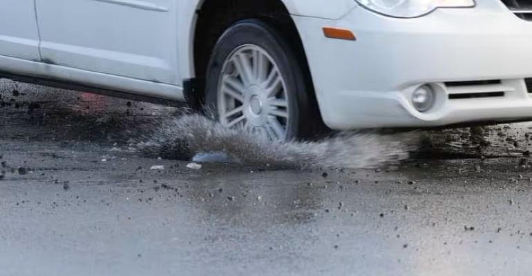Car-Hitting-Pothole-Featured.jpg
